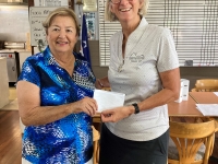 Carolyn Foster being congratulated by Women’s Captain Wendy O’Hare on winning the 2-week Stableford Eclectic on 21 April 2022.